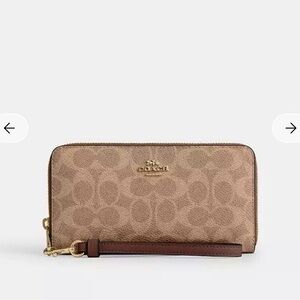 Coach Long Zip Around Wallet
In Signature Canvas